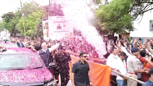 Gujarat: PM Modi responds to a child with a salute during Bhavnagar roadshow
