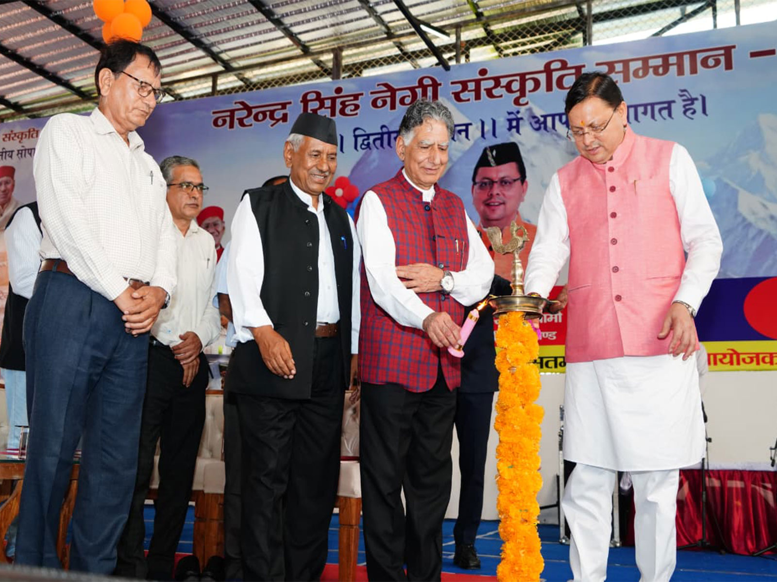 Uttarakhand CM Pushkar Singh Dhami participates in ‘Narendra Singh Negi Cultural Award’ (Photo/ANI)